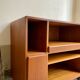 Danish storage cabinet Komfort on teak and rosewood wheels