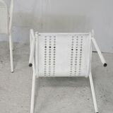 Pair of honeycomb steel armchairs. France, circa 1950.