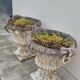 Pair of planter vases decorated with faces in reconstituted stone 1950s