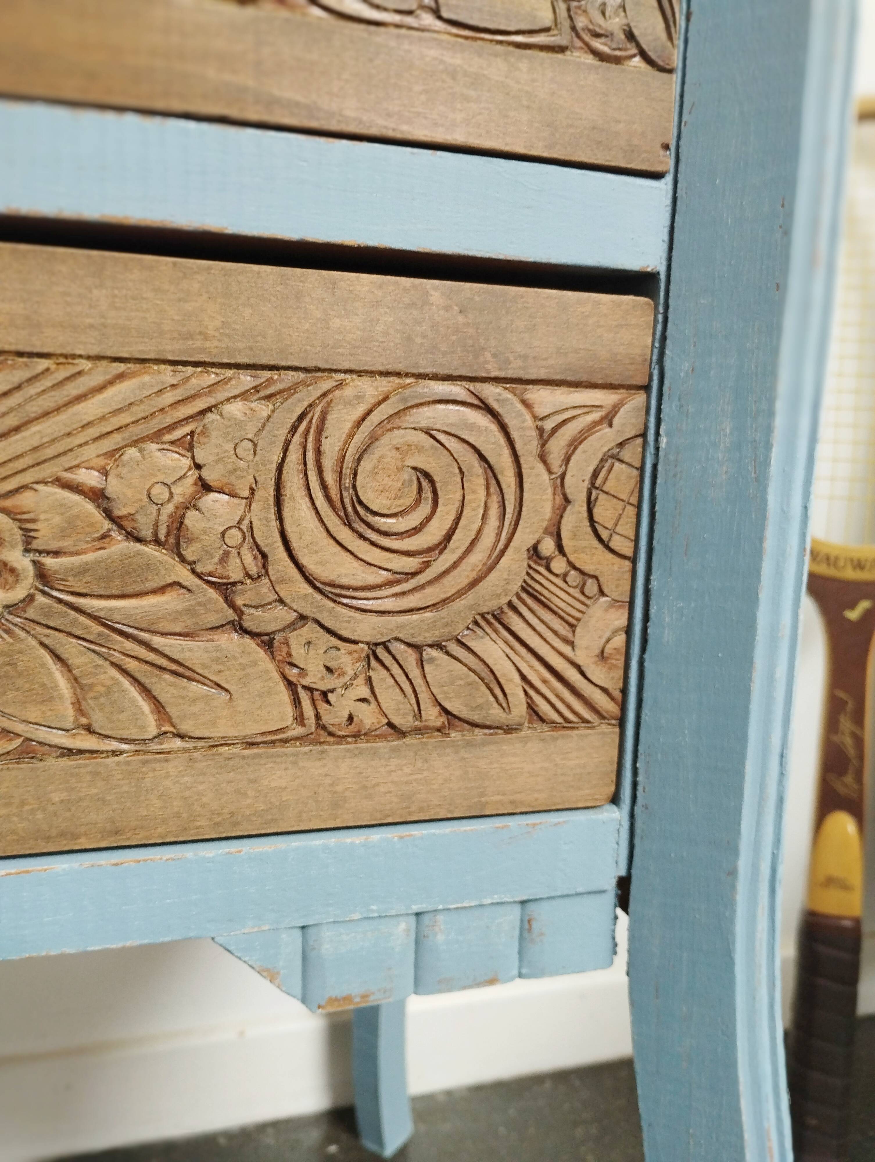 Small carved wood chest of drawers