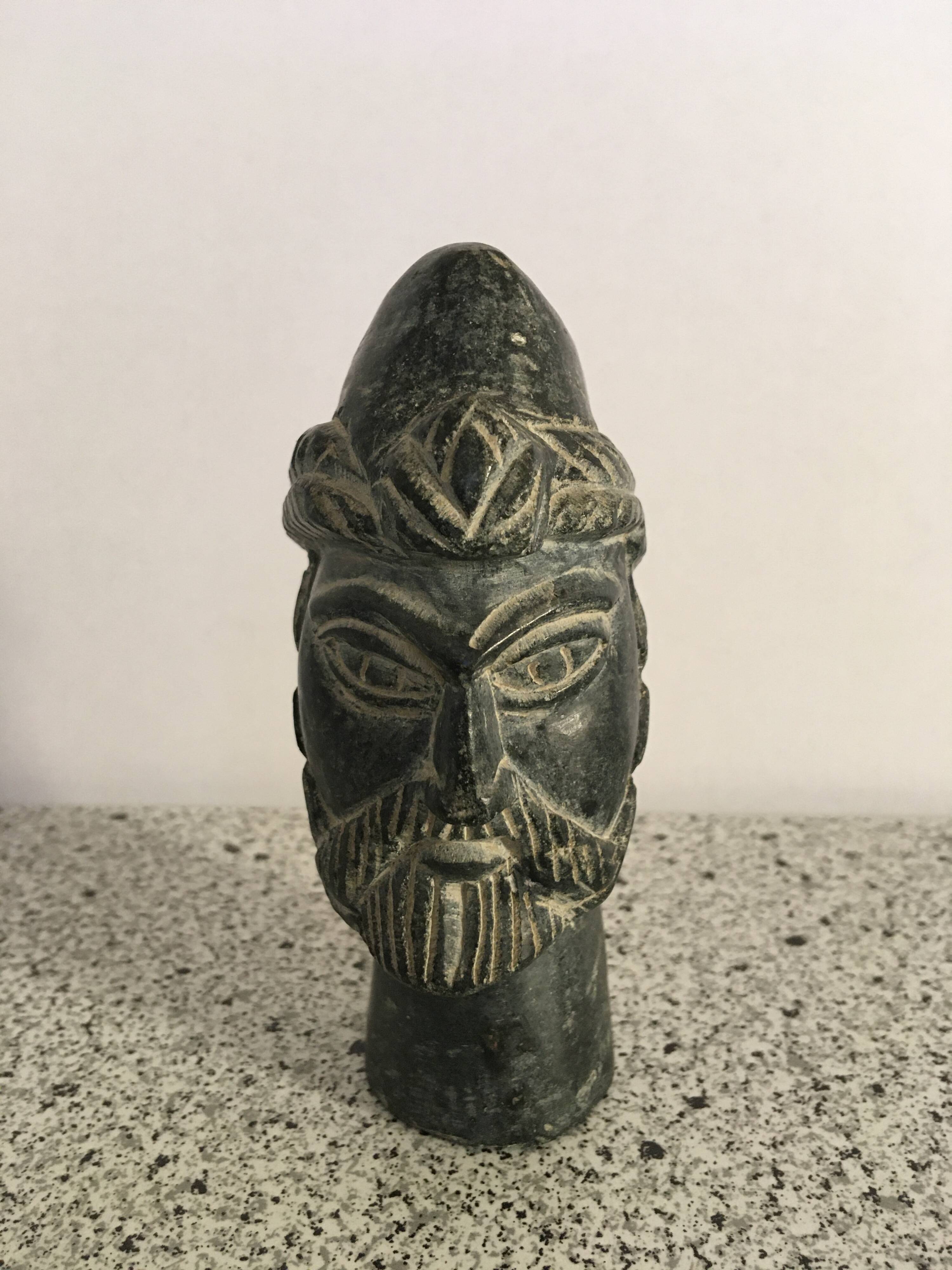 Black marble bust sculpture