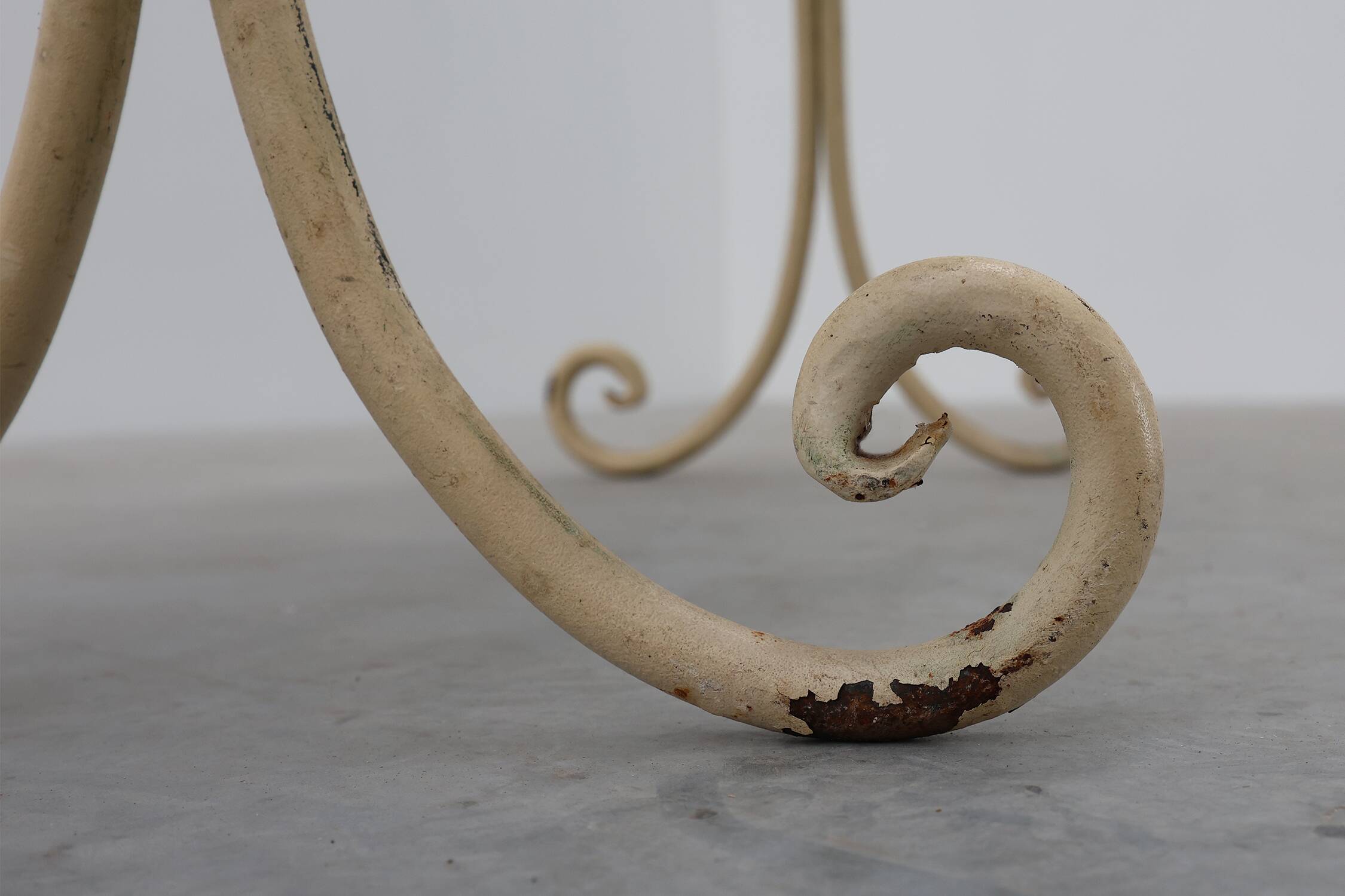 20th century French bistro table with cast iron base and oak top