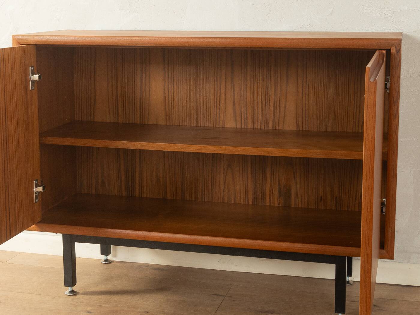Classic chest of drawers from the 1960s with practical, closed storage space