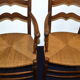 2 country style oak chairs
