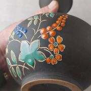 Old vase, enamelled flower decoration, to be identified