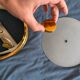 Lunel ceiling light / Porthole / Brass, perforated metal and glass