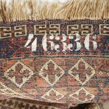 Tapis ancien noué main numéroté