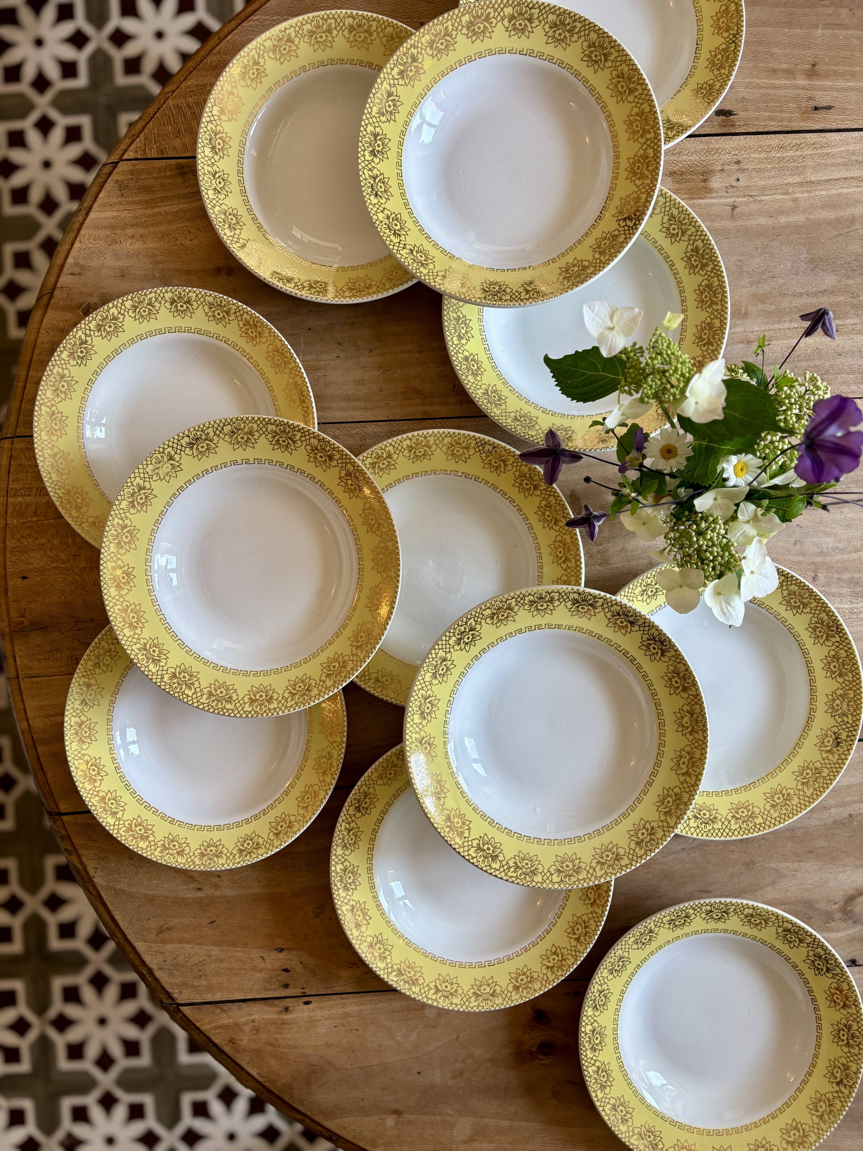 Set of 12 vintage yellow, white and gold soup plates