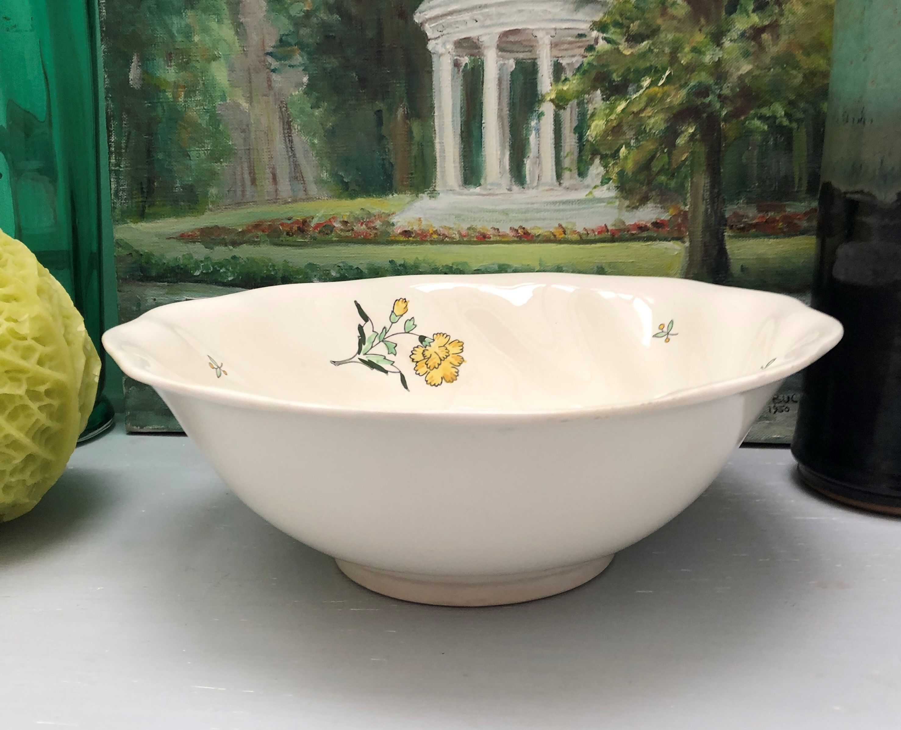 Round dish model embrun, with yellow floral patterns. stamped salins france