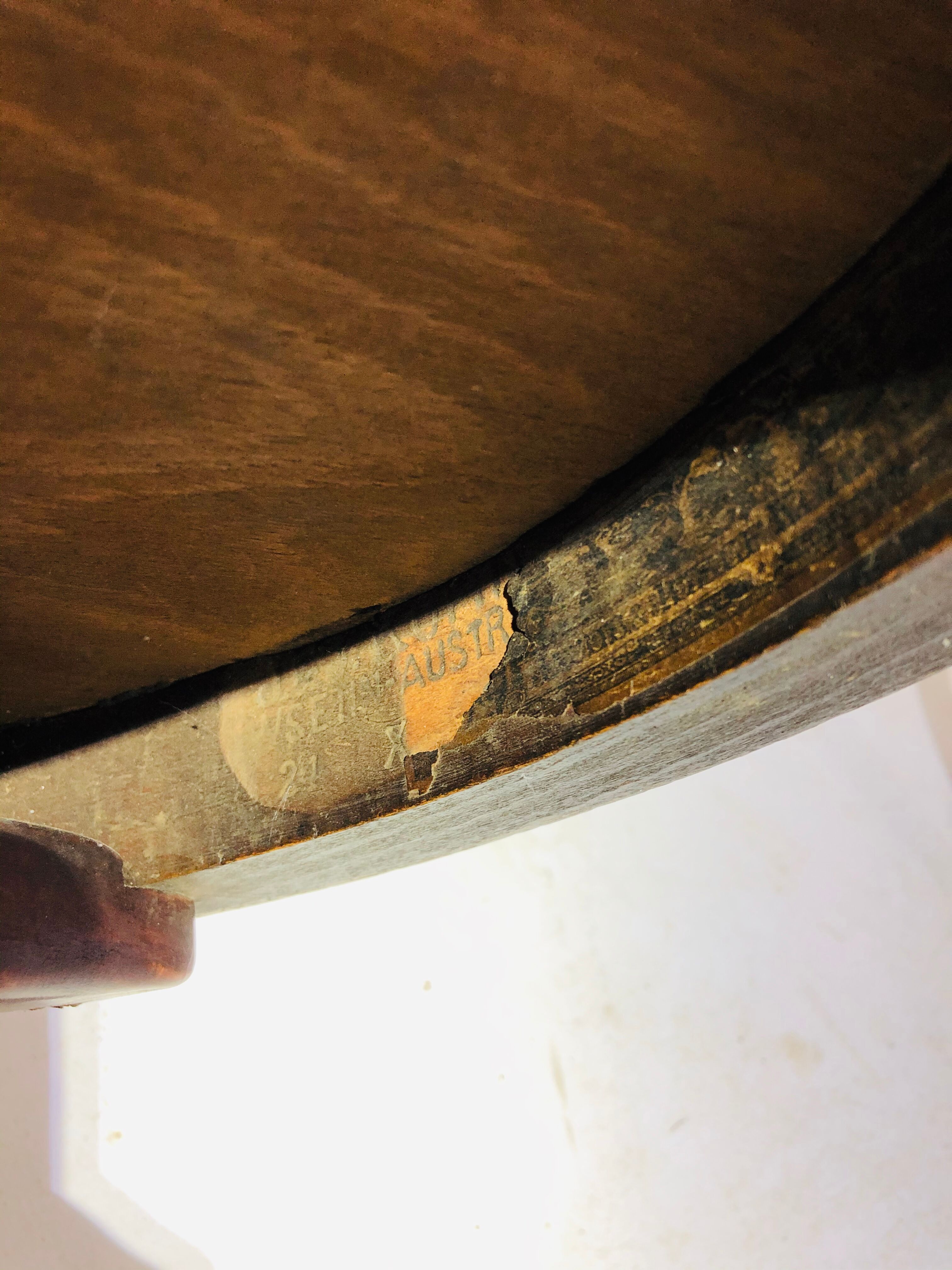 Swivel wooden armchair