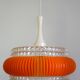Transparent plastic space age lustre with orange band from the 70s.