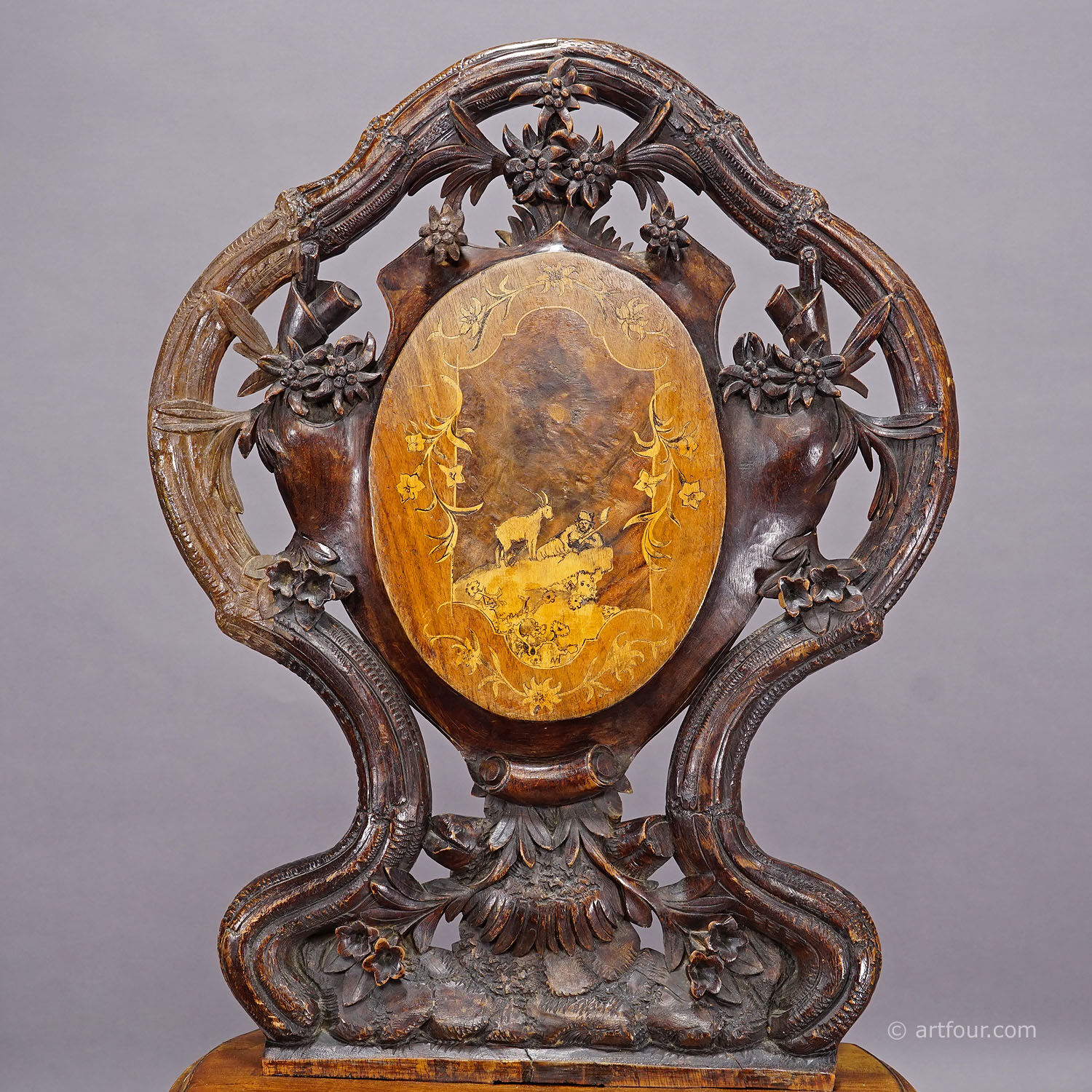 Pair of walnut chairs with Edelweiss marquetry, Brienz Switzerland 1900