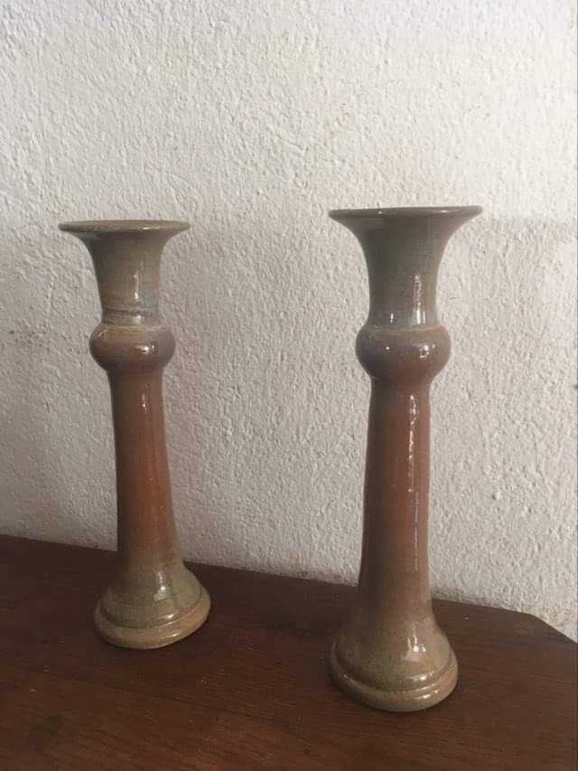 Terracotta candlesticks signed