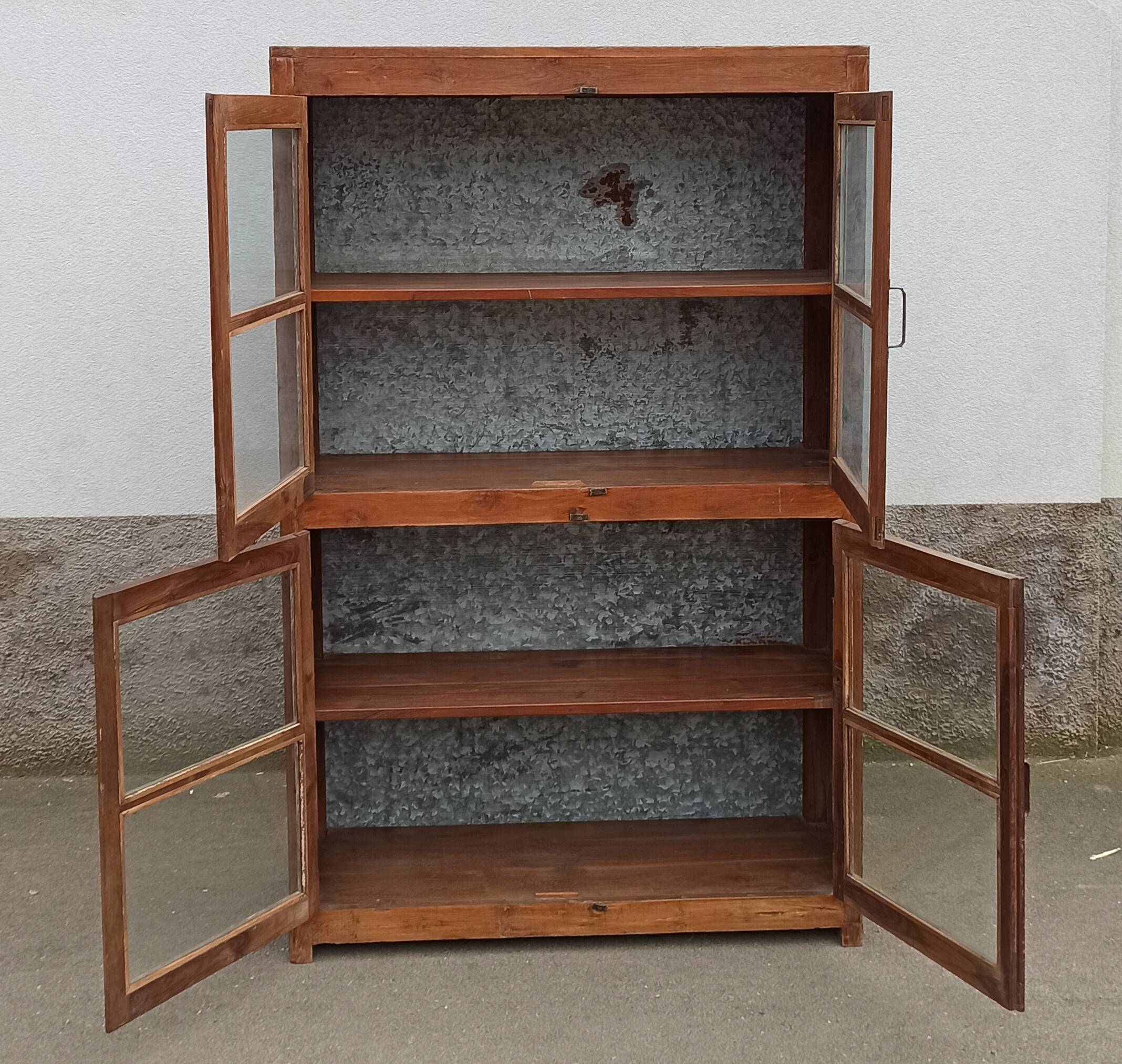 Old glass cabinet in wood and metal