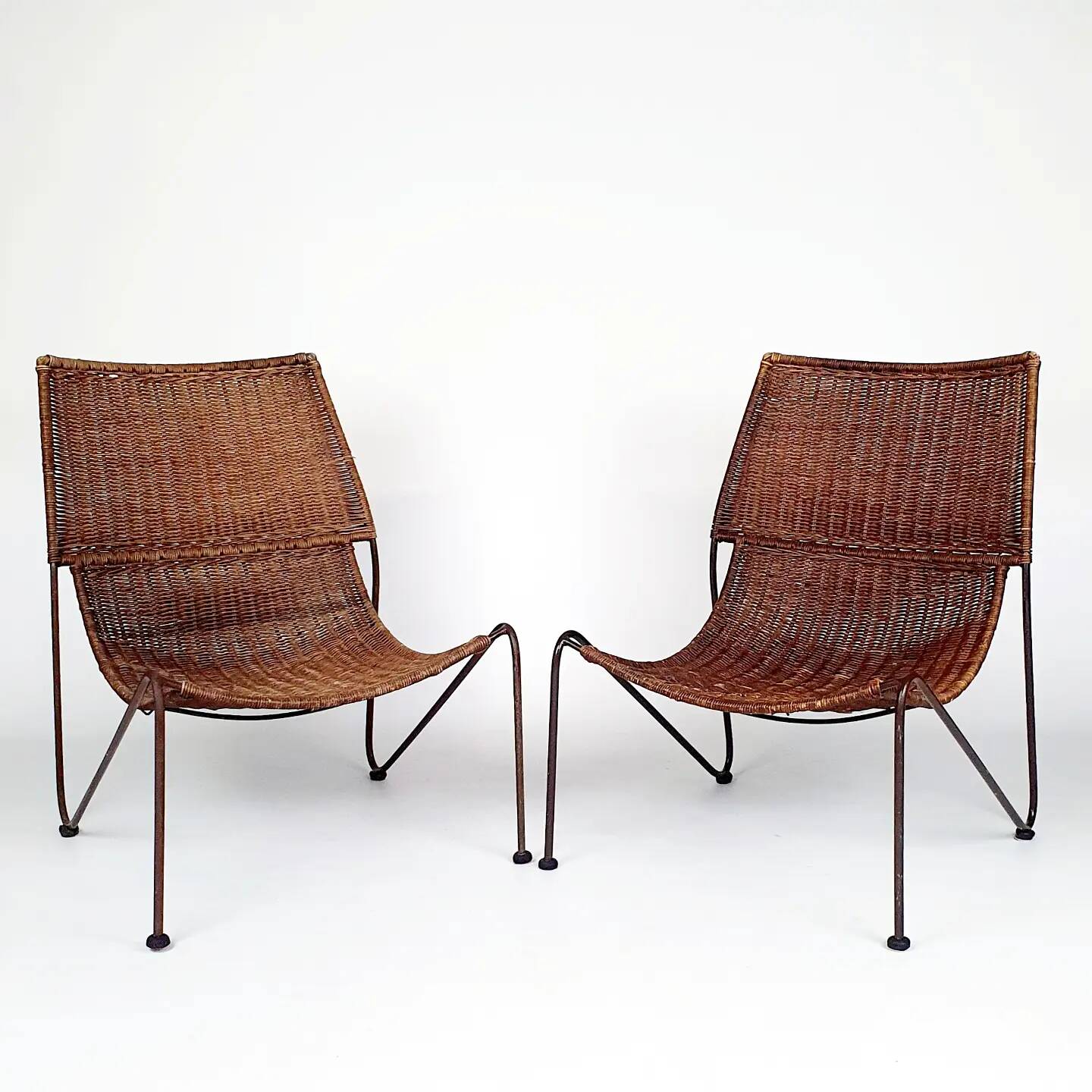 Pair of "Mombasa" rattan and steel armchairs by Pier One
