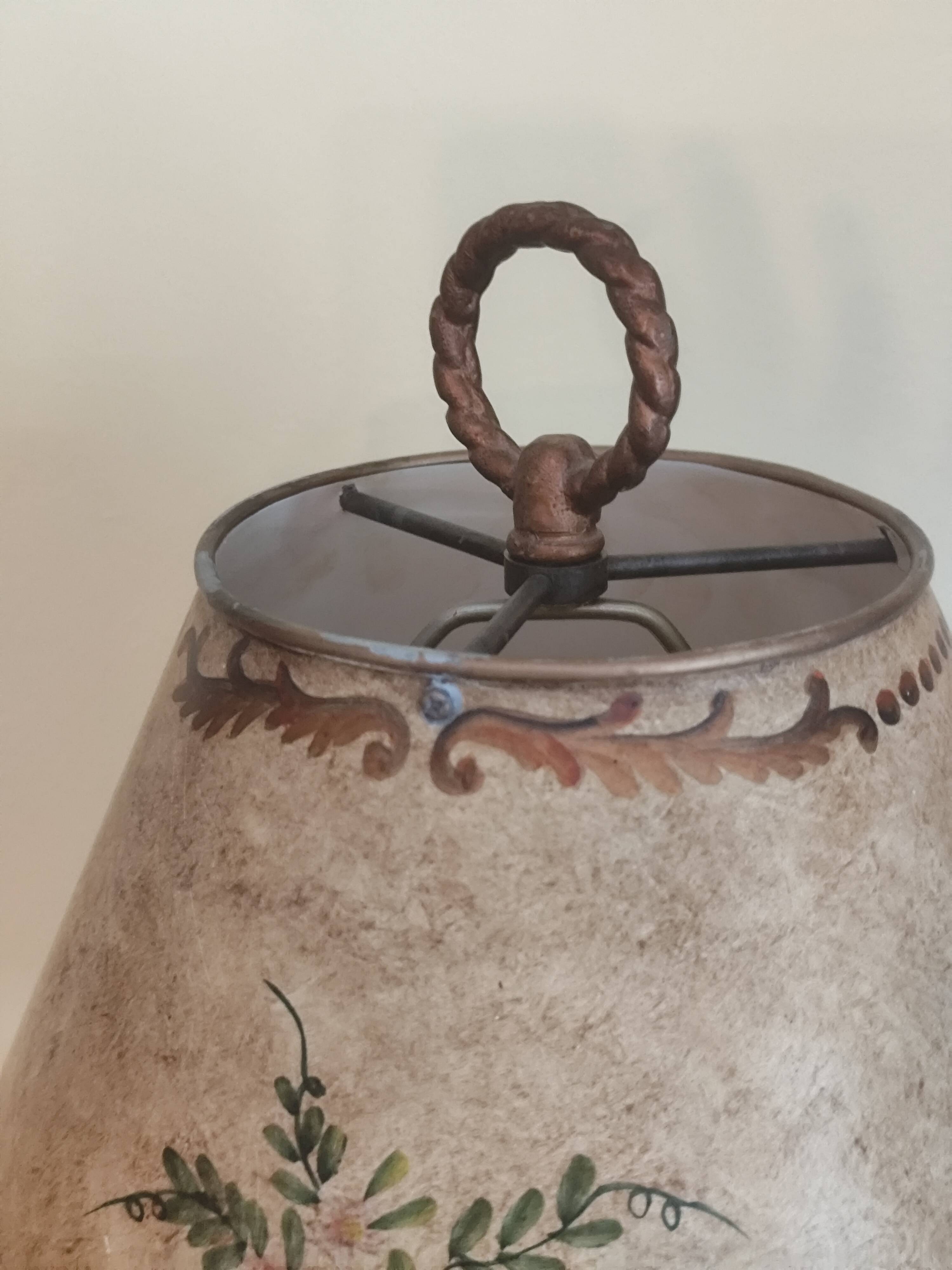 Large pagoda lamp painted with floral patterns and metal shade.