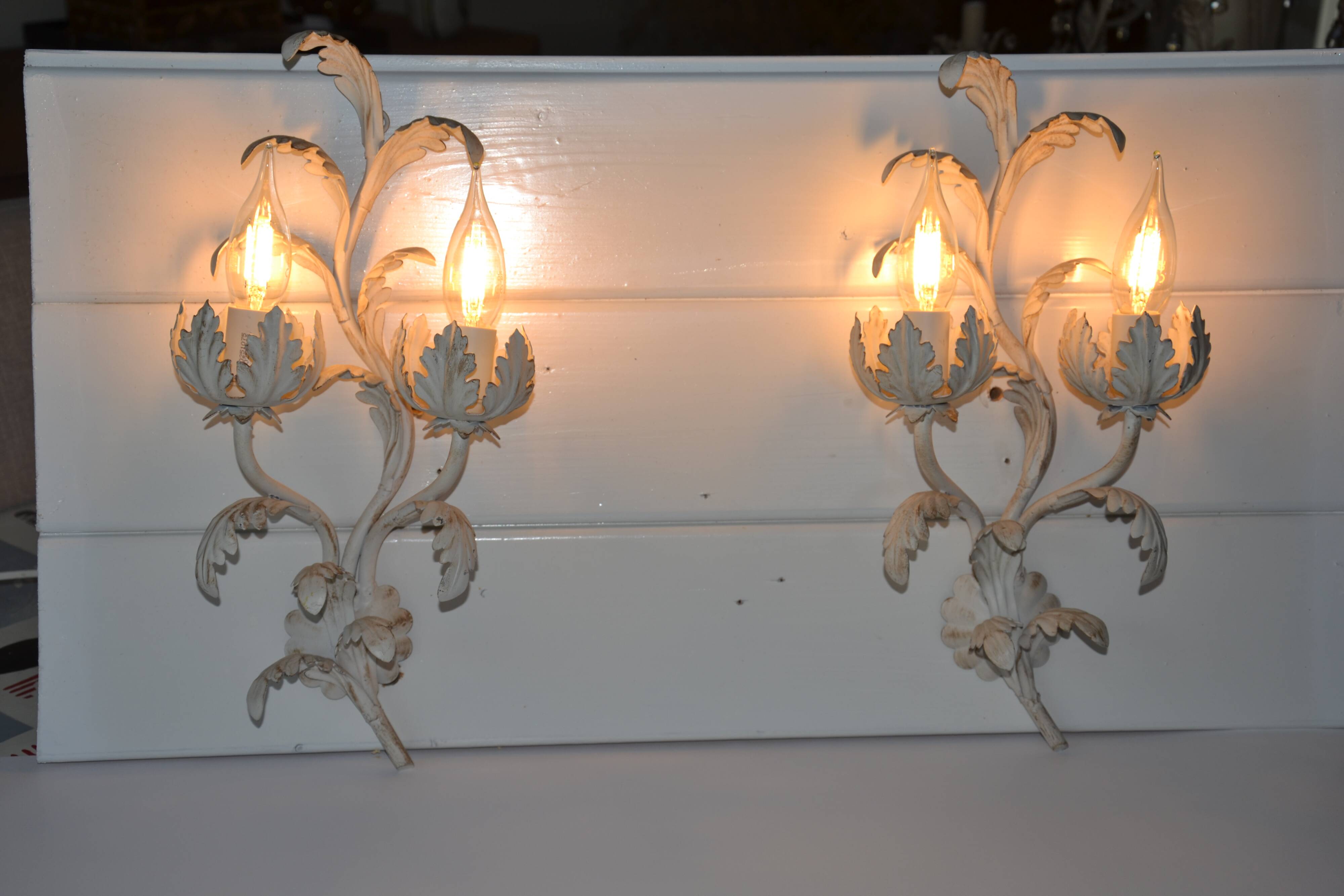 2 Florentine metal leaf wall lights