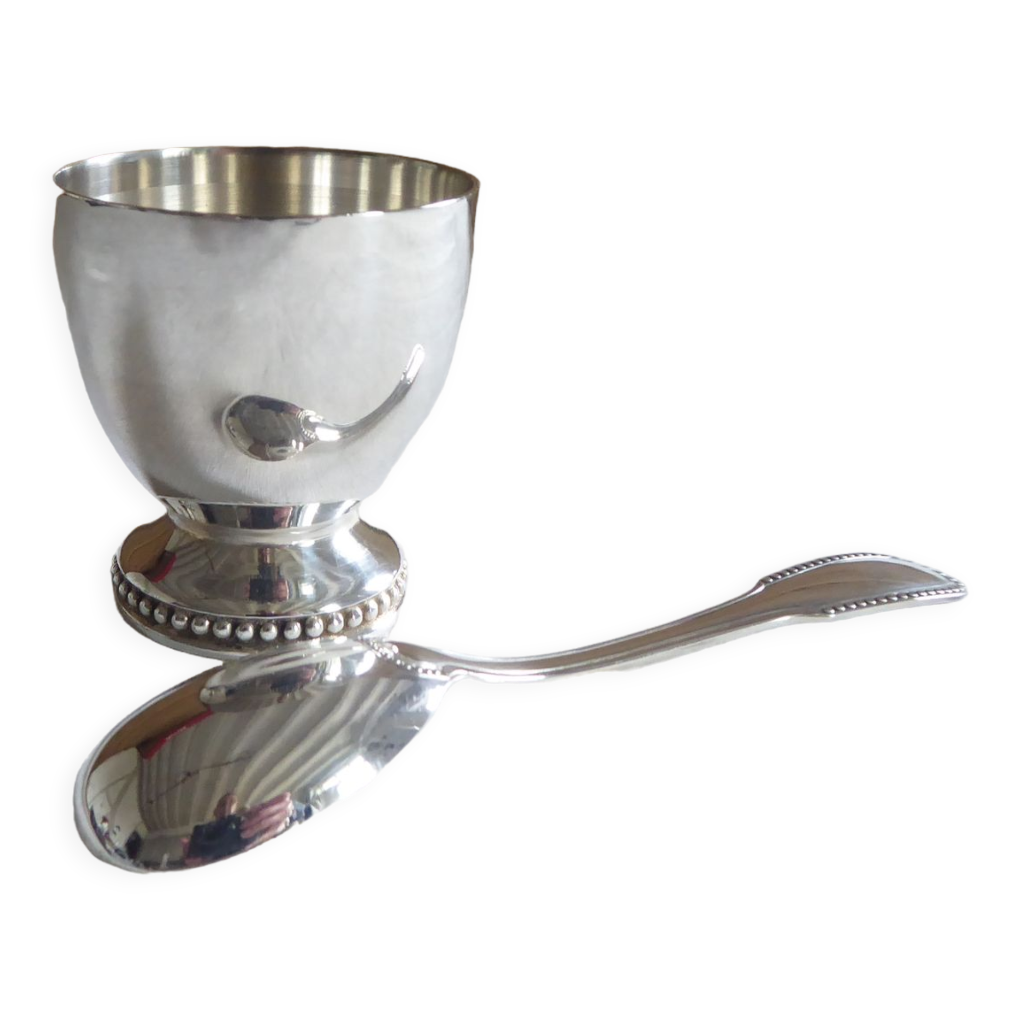 Cockerel + silver metal spoon