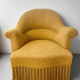 Fauteuil crapaud en tissu jaune