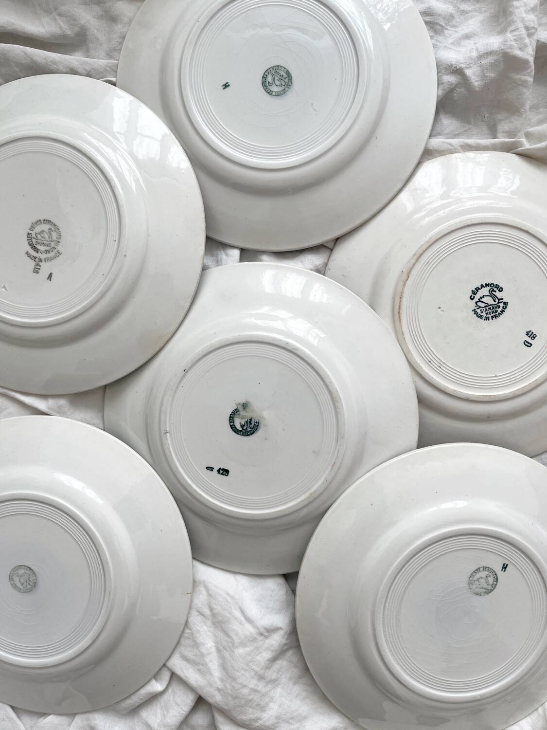 6 mismatched ironstone dinner plates from Saint Amand