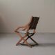 Foldable chair in solid wood and striped fabric, circa 1900.