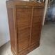 Antique 1950s double sliding door filing cabinet with curtains