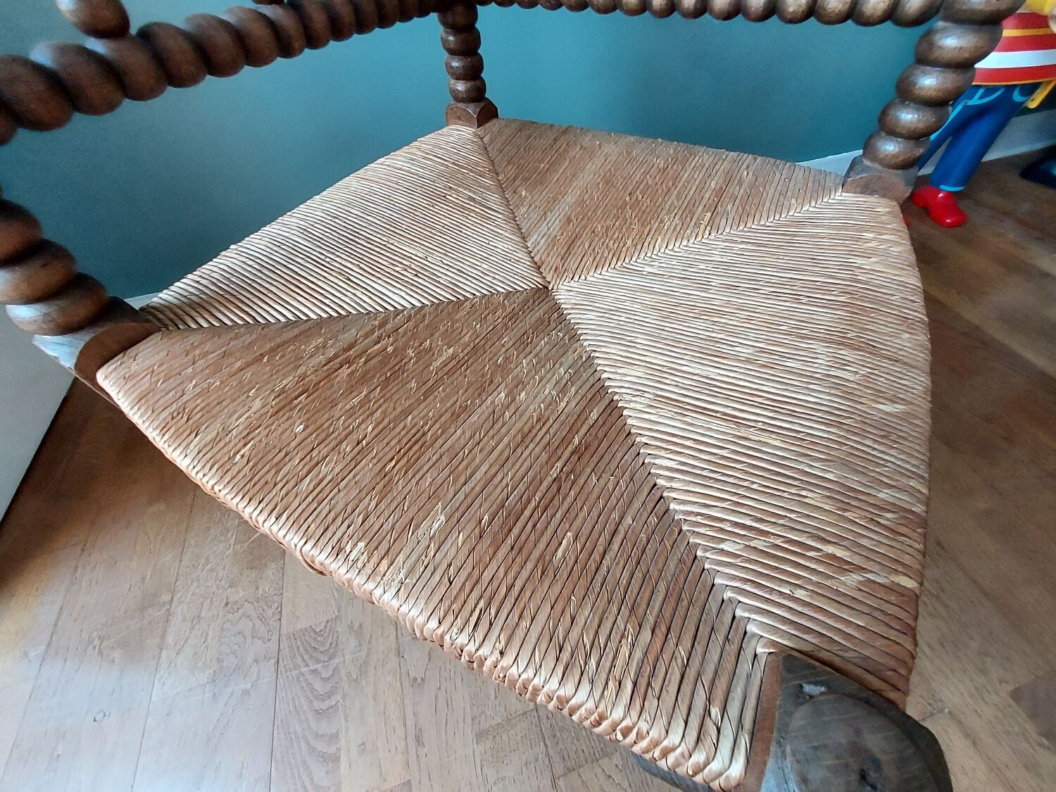 Corner armchair in turned wood