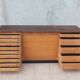 Workshop furniture with drawers and curtain in beech and walnut.