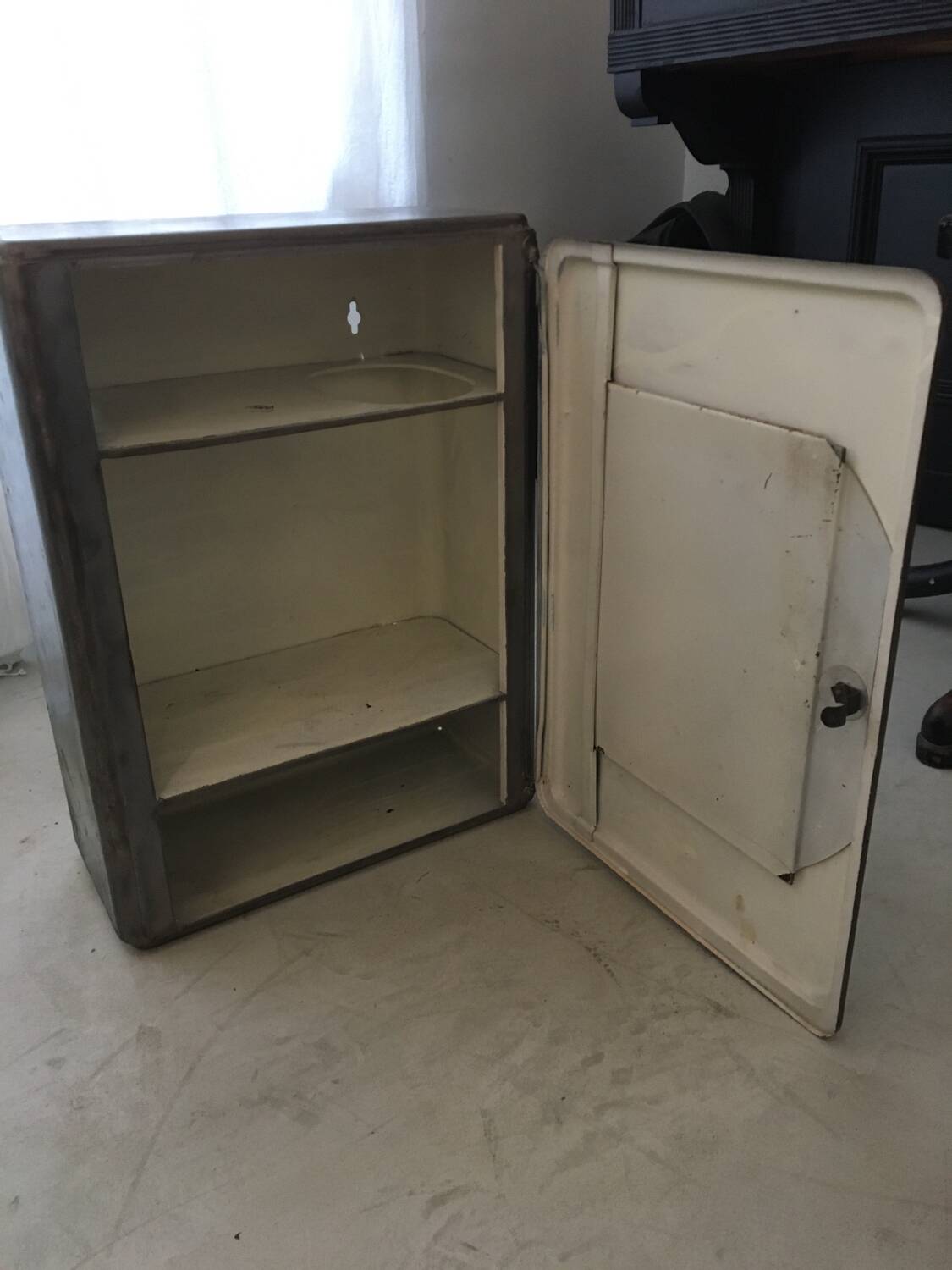 Gray metal medicine cabinet