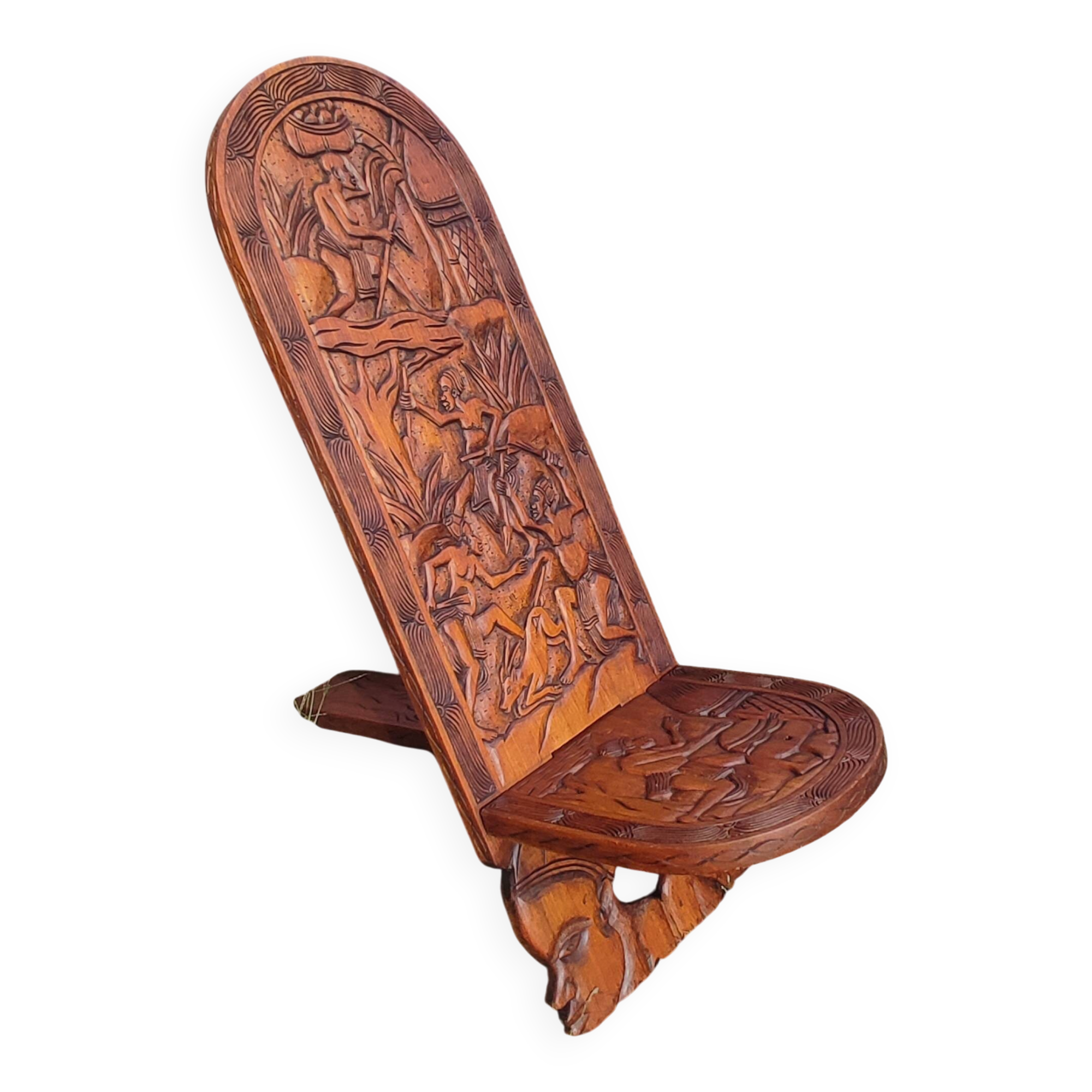 Old African wooden carved talking chair.