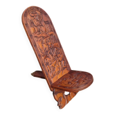 Old African wooden carved talking chair.