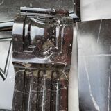 Pompadour fireplace with black marble modillions