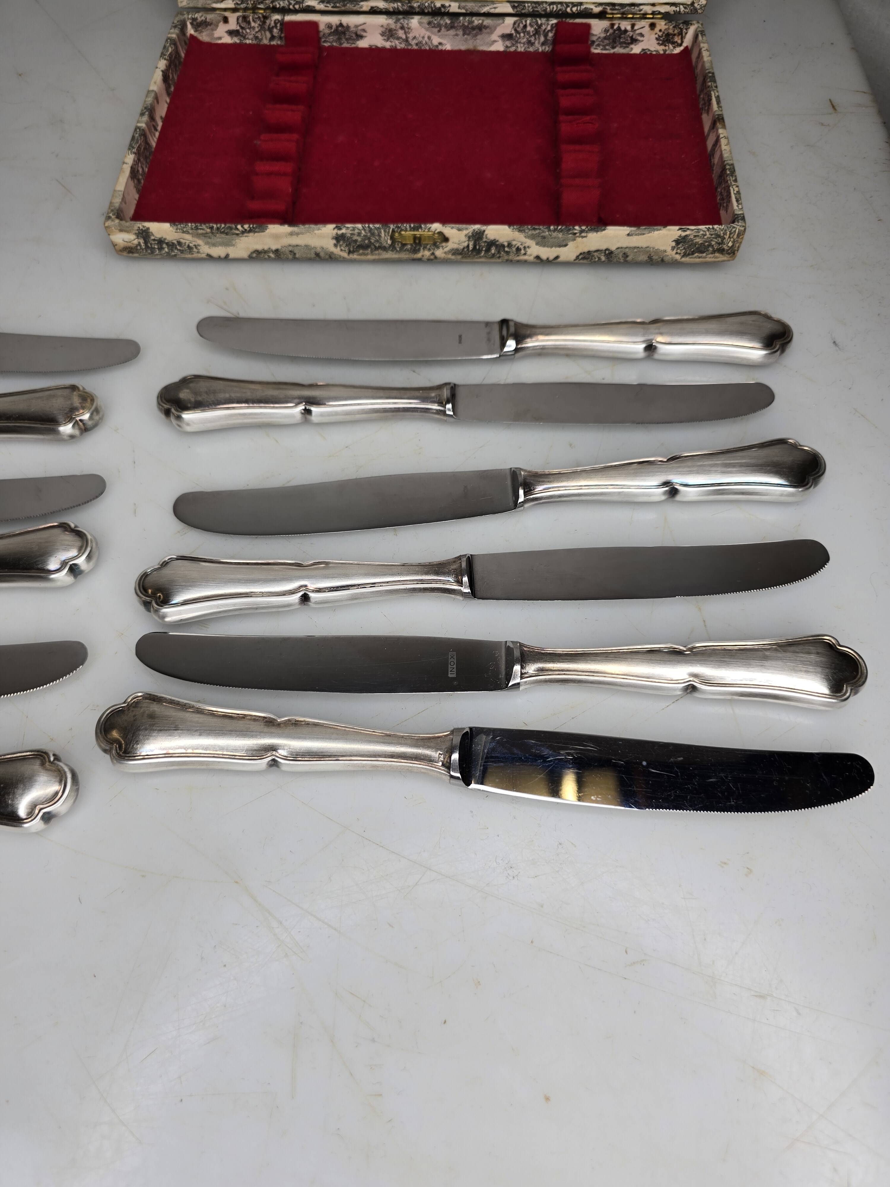 12 silver-plated knives mid-15th century