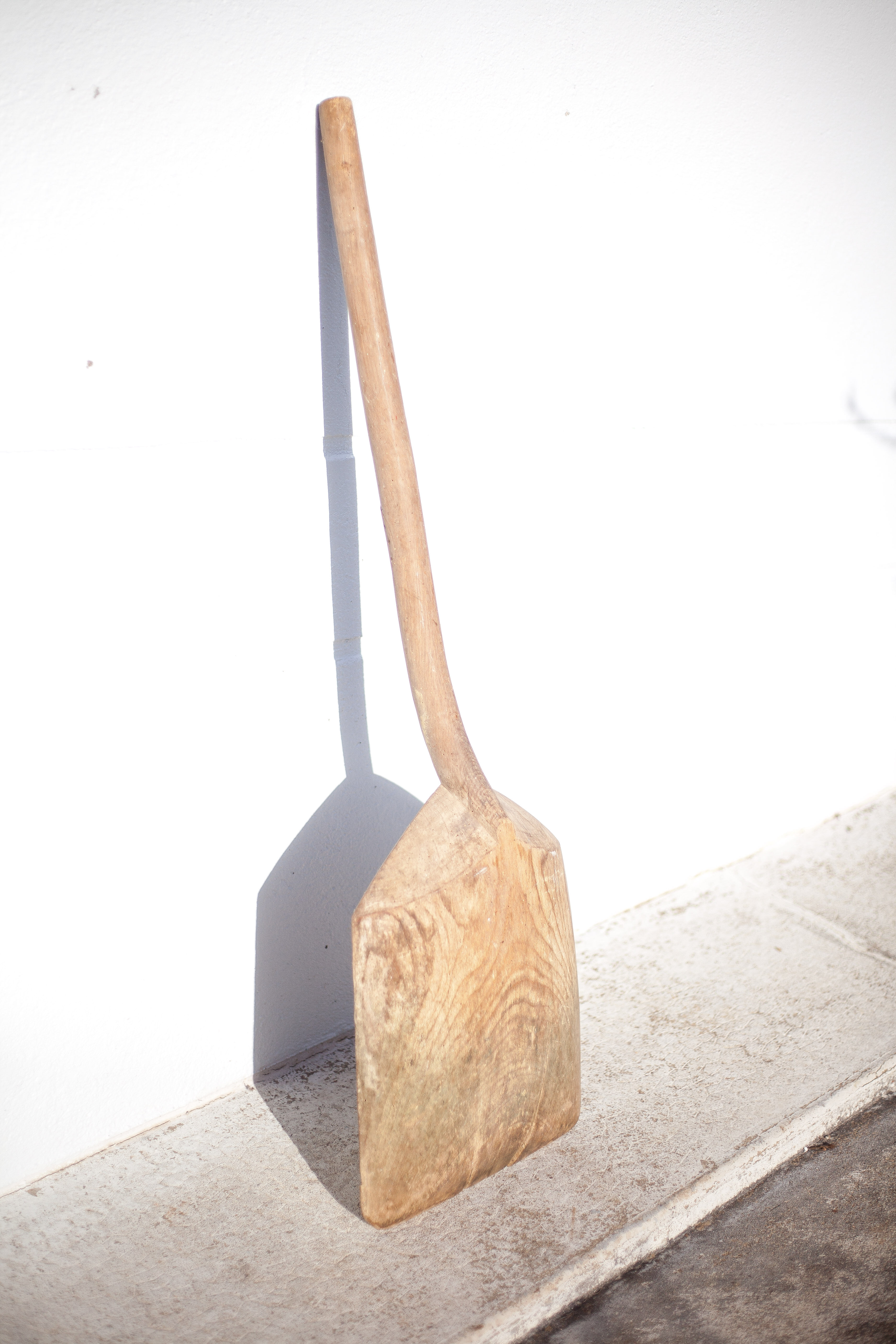 Old wood grain shovel, large wooden shovel, rustic, countryside, decoration