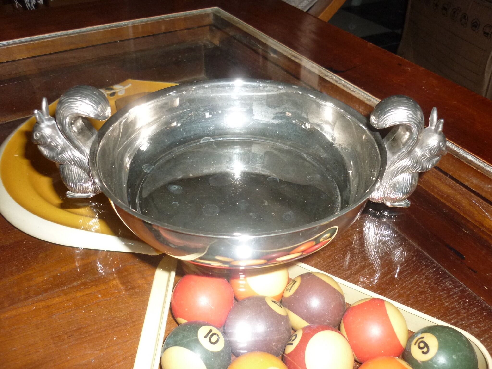 Silver metal dish with squirrels