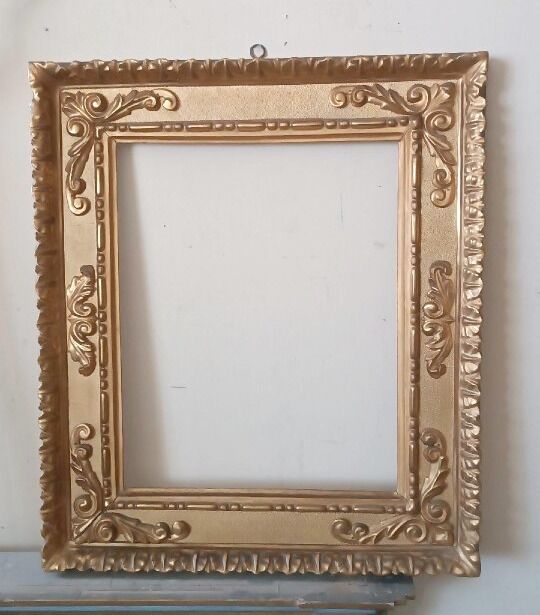 Miroir ancien en bois doré