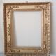 Miroir ancien en bois doré