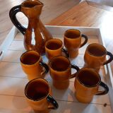 Old service 1 pitcher and 8 mugs/cups