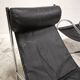 Pair of "Omega" armchairs, chrome-plated metal and leather, Habitat vintage 1980