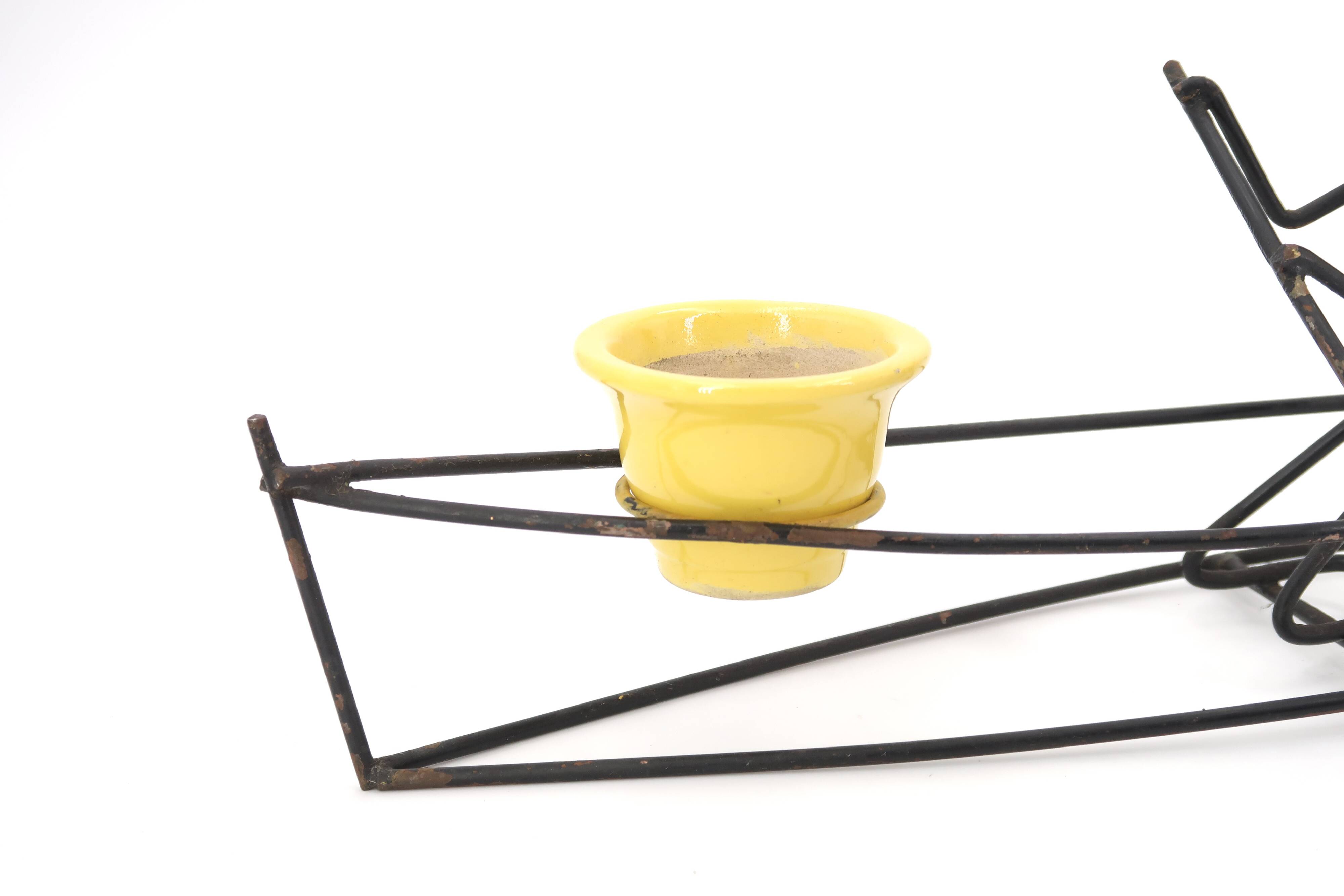 Ceramic flower pot in dugout with Indian, 1950s