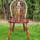 4 Windsor wheelback chairs in dark oak