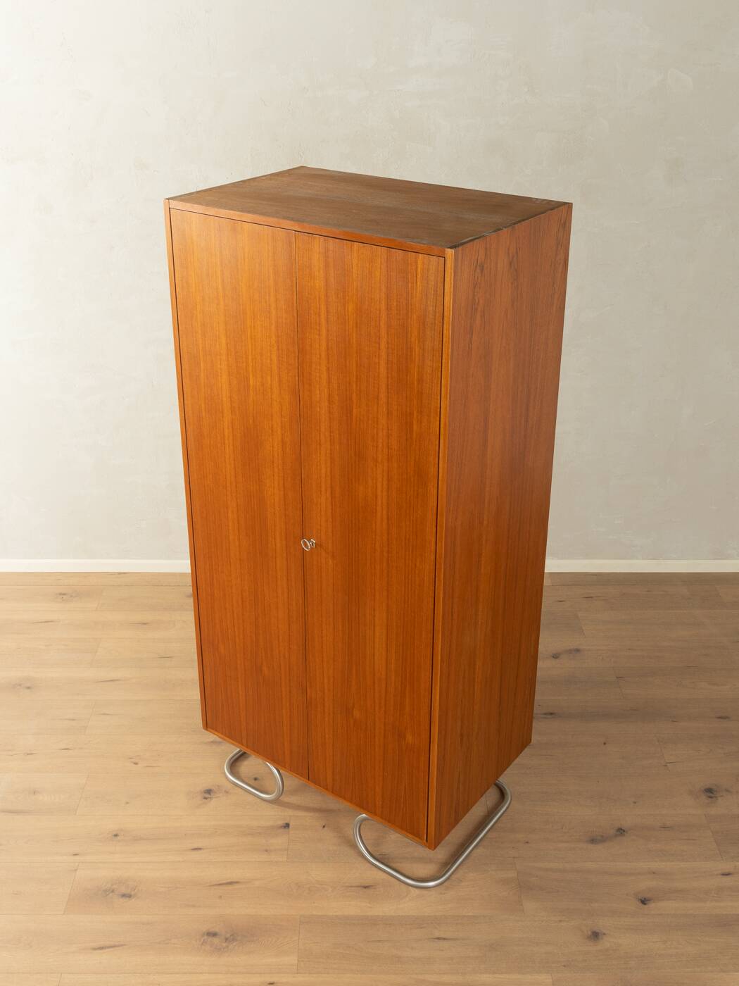 Purist wardrobe from the 1960s in teak veneer by DeWe