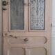 Old entrance door, glazed oak cast iron grilles 1925