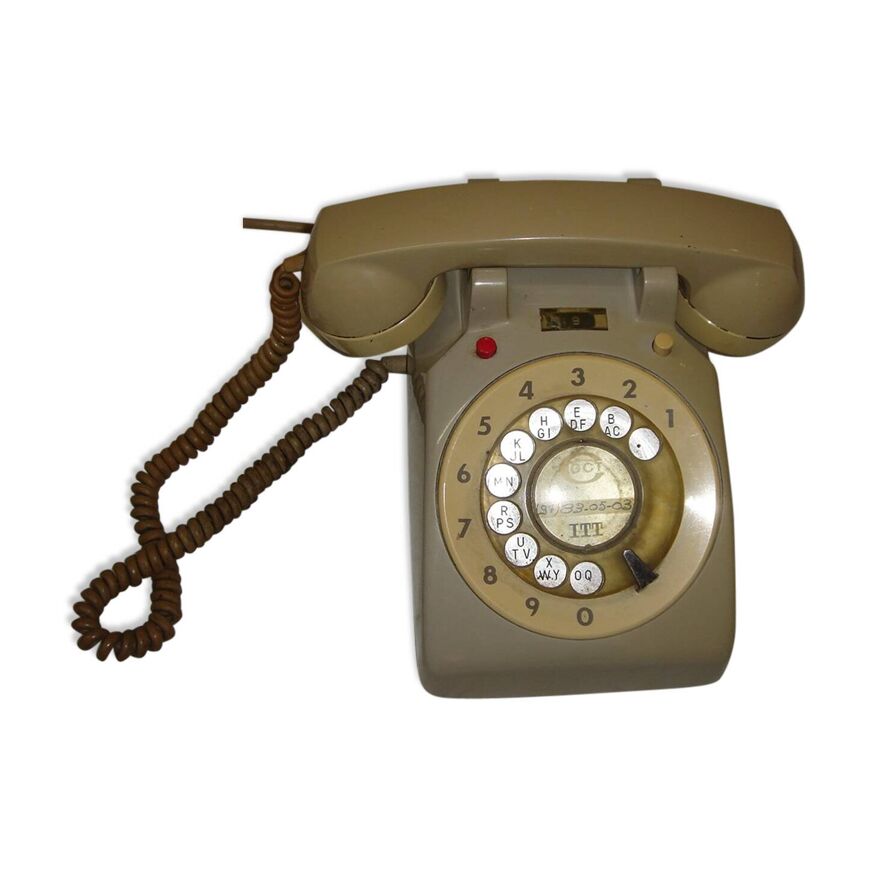 Old itt telephone from the 1960s/1970s with dial | Selency