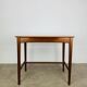 Minimalist Scandinavian teak desk from the 1960s, vintage.