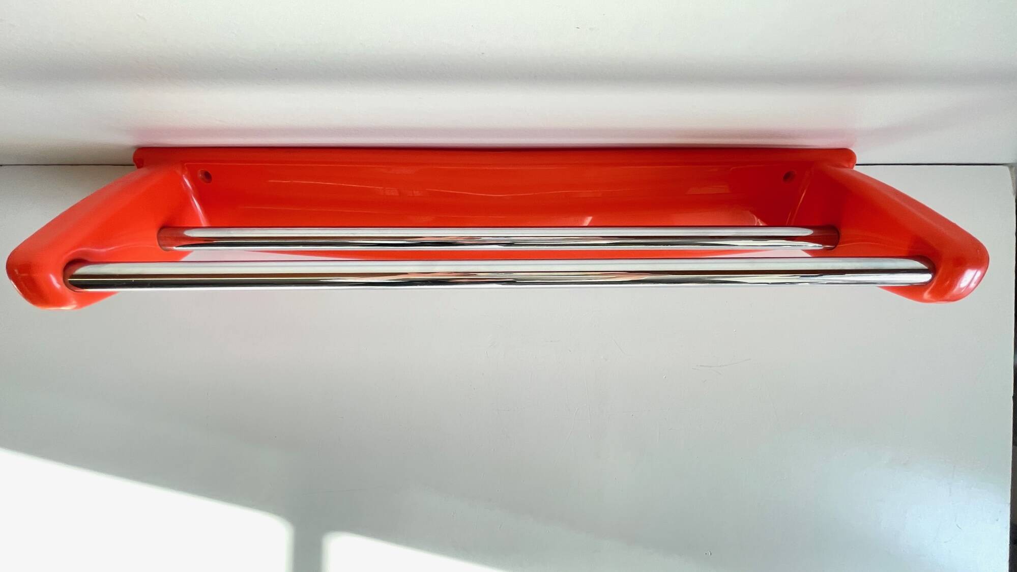Orange towel rack by Syla from the 70s
