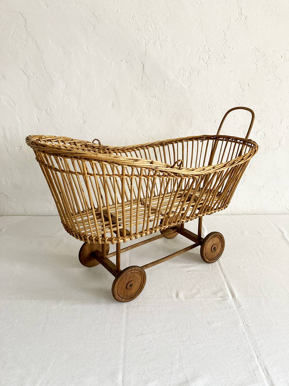Old rattan doll's pram