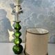 Green ceramic sun lamp/table, Kaiser Leuchten, Germany, 1960s elegance.