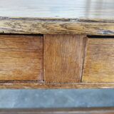 Table in raw oak, countryside.