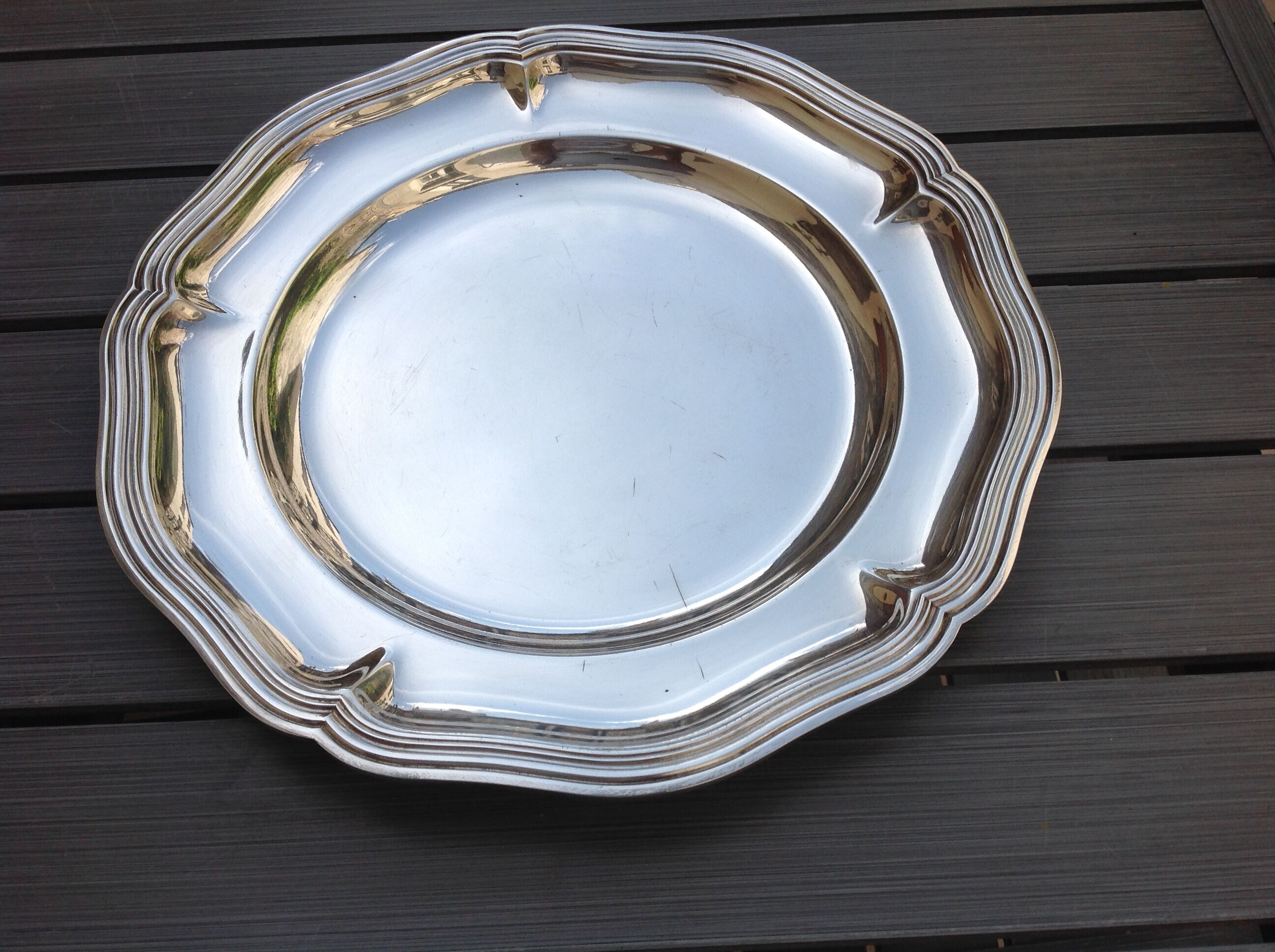 Silver metal dish with twisted edges
